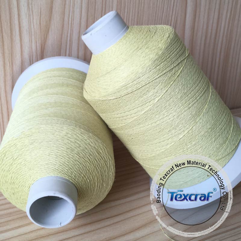 Aramid coated stainless steel yarn