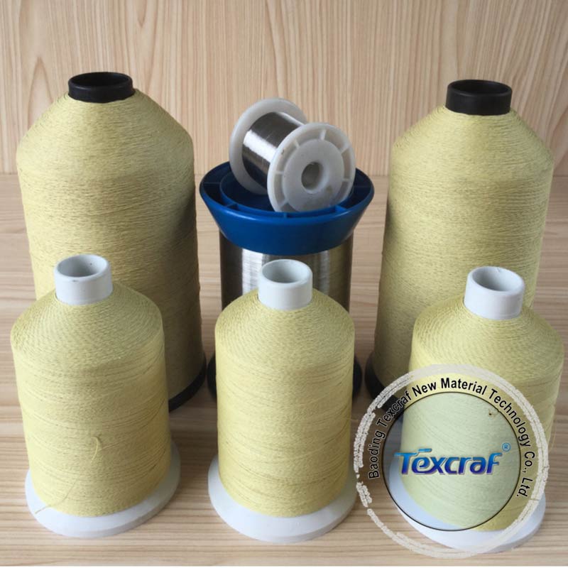 Aramid coated stainless steel yarn