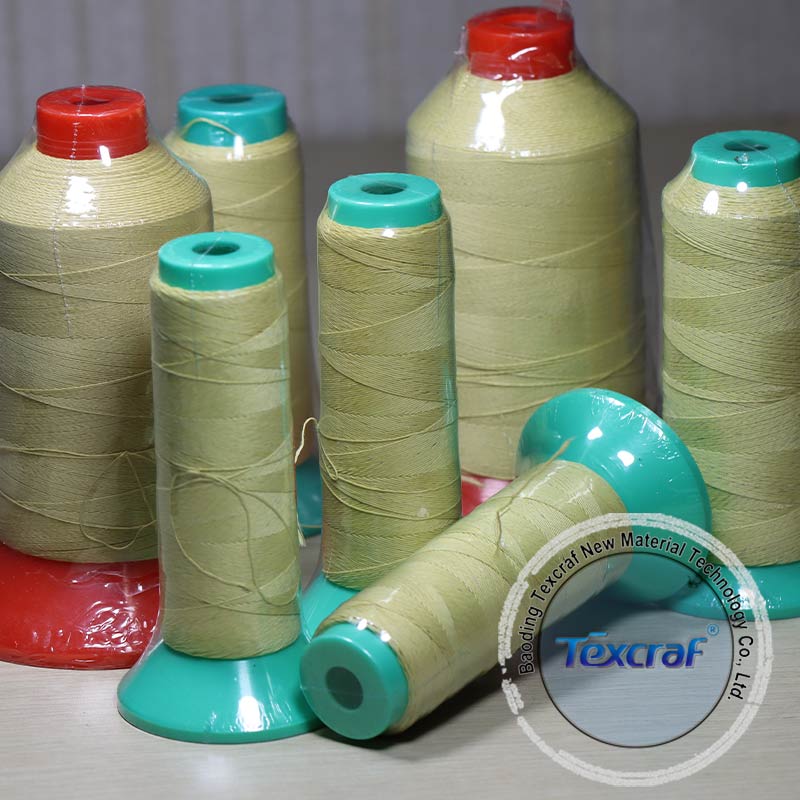 Aramid coated stainless steel yarn